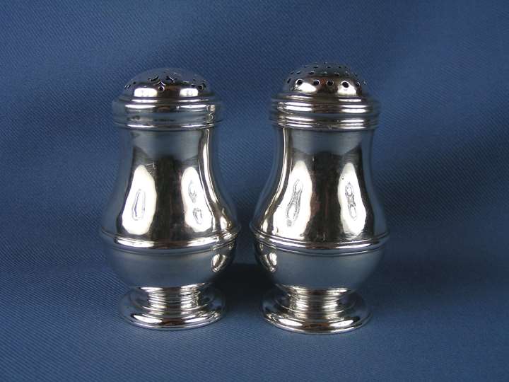 Pair of George I silver salt and pepper